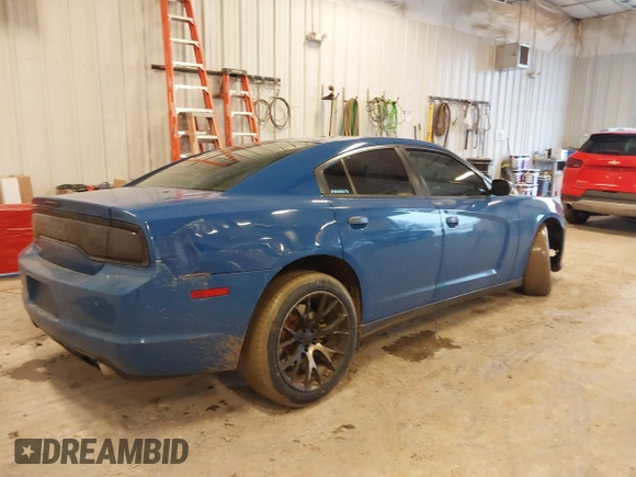 2014 Dodge Charger Police z VIN 2C3CDXAT5EH218901, wystawiony jako IAAI lot #41723531 z przebiegiem 216 643 mil mil oraz . Historia ofert i sprzedaży dostępna na DreamBid. Obrazek 4.