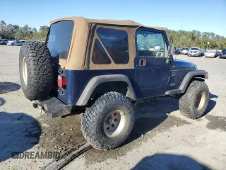 2000 Jeep Wrangler Sport with VIN 1J4FA49S7YP802304, listed as a Copart auction lot 47854795 with 0 mi miles and Salvage Title. Bid and sale history available at carsss.com. Image 3.