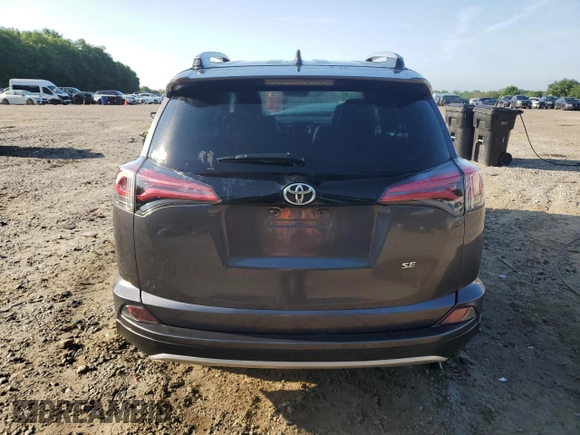 2018 Toyota RAV4 SE with VIN JTMNFREV6JJ157671, listed as a Copart auction lot 55476875 with 93,749 mi miles and Salvage title. Bid and sale history available at DreamBid. Image 6.