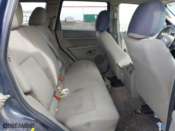 2005 Jeep Grand Cherokee Laredo with VIN 1J8GR48K45C534005, listed as a IAAI auction lot 41759692 with 211,566 mi miles. Bid and sale history available at carsss.com. Image 8.