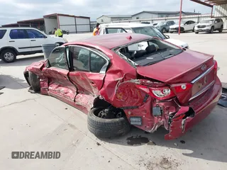 2015 Infiniti Q50 with VIN JN1BV7AP1FM347808, listed as a IAAI auction lot 41781327 with 57,140 mi miles and . Bid and sale history available at carsss.com. Image 3.