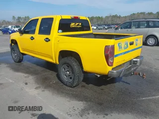 2012 GMC Canyon SLE1 with VIN 1GTH6MFEXC8142583, listed as a IAAI auction lot 41465963 with 276,053 mi miles. Bid and sale history available at carsss.com. Image 3.