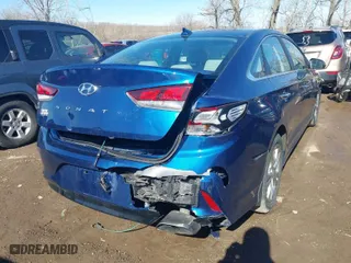 2019 Hyundai Sonata Sport with VIN 5NPE34AF4KH804430, listed as a IAAI auction lot 41663733 with 51,297 mi miles. Bid and sale history available at carsss.com. Image 4.