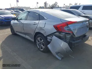 2019 Honda Civic Sedan LX with VIN 19XFC2F67KE203650, listed as a IAAI auction lot 41372503 with 128,034 mi miles. Bid and sale history available at carsss.com. Image 3.