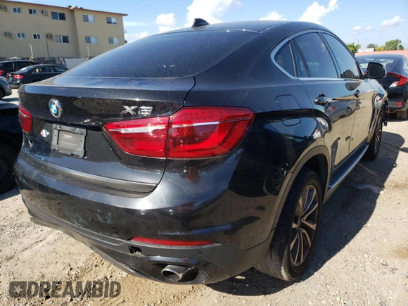 2015 BMW X6 sDrive35i with VIN 5UXKU0C50F0F91736, listed as a Copart auction lot 56662172 with 67,560 mi miles. Bid and sale history available at carsss.com. Image 4.