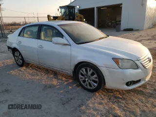 2009 Toyota Avalon XL with VIN 4T1BK36B19U339669, listed as a Copart auction lot 48547195 with 243,217 mi miles and Salvage Title. Bid and sale history available at carsss.com. Image 4.