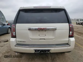 2015 GMC Yukon Denali with VIN 1GKS1CKJ1FR619793, listed as a Copart auction lot 86910314 with 128,559 mi miles and Salvage Title. Bid and sale history available at carsss.com. Image 6.