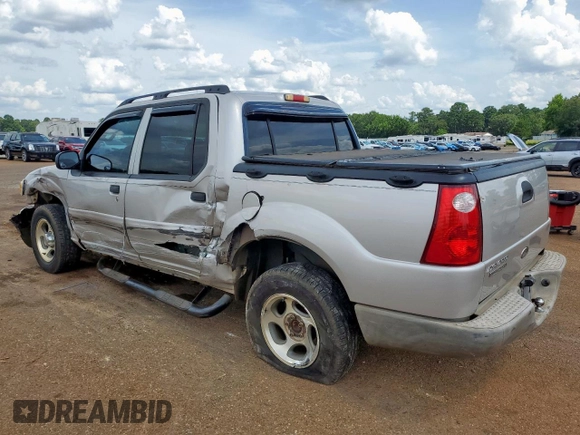 2005 Ford Explorer Sport Trac XLS with VIN 1FMZU67K95UA94980, listed as a Copart auction lot 63490315 with 126,737 mi miles and Salvage title. Bid and sale history available at DreamBid. Image 2.
