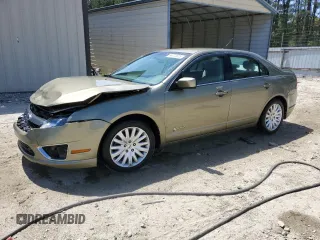 2012 Ford Fusion Hybrid with VIN 3FADP0L3XCR267935, listed as a Copart auction lot 54770805 with 144,794 mi miles and Salvage title. Bid and sale history available at DreamBid. Image 1.