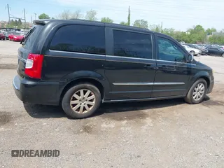2011 Chrysler Town & Country Touring L with VIN 2A4RR8DGXBR614723, listed as a IAAI auction lot 42156531 with 116,759 mi miles and . Bid and sale history available at DreamBid. Image 4.