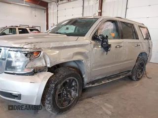 2016 Chevrolet Tahoe LTZ with VIN 1GNSKCKCXGR477284, listed as a IAAI auction lot 42221589 with Not provided miles and . Bid and sale history available at DreamBid. Image 6.