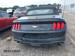 2021 Ford Mustang EcoBoost z VIN 1FATP8UH2M5120226, wystawiony jako IAAI lot #42164009 z przebiegiem 85 571 mil mil oraz . Historia ofert i sprzedaży dostępna na DreamBid. Obrazek 17.