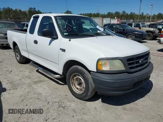 2003 Ford F-150 XL with VIN 1FTRX172X3NA59676, listed as a IAAI auction lot 41821013 with 249,483 mi miles. Bid and sale history available at carsss.com. Image 1.