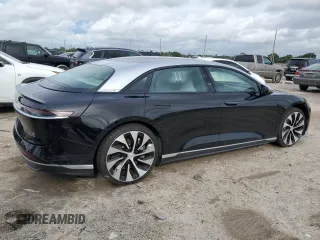 2022 Lucid Air Grand Touring z VIN 50EA1GBA6NA001280, wystawiony jako Copart lot #74004994 z przebiegiem Nie podano mil oraz Szkody całkowita. Historia ofert i sprzedaży dostępna na DreamBid. Obrazek 3.