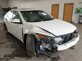2010 Acura TSX with VIN JH4CU2F61AC043558, listed as a IAAI auction lot 41724293 with 82,036 mi miles. Bid and sale history available at carsss.com. Image 1.