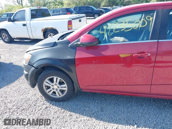 2013 Chevrolet Sonic LT with VIN 1G1JC5SH3D4256507, listed as a IAAI auction lot 42235009 with 117,804 mi miles and . Bid and sale history available at DreamBid. Image 14.