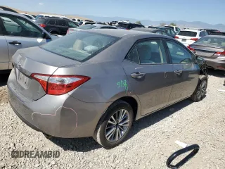 2014 Toyota Corolla L with VIN 5YFBURHE0EP014897, listed as a Copart auction lot 60668845 with 266,691 mi miles and Salvage title. Bid and sale history available at DreamBid. Image 3.
