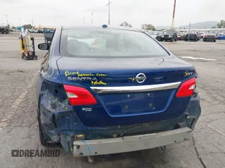 2019 Nissan Sentra SV z VIN 3N1AB7AP6KY221889, wystawiony jako IAAI lot #42077285 z przebiegiem 254 481 mil mil oraz . Historia ofert i sprzedaży dostępna na DreamBid. Obrazek 17.