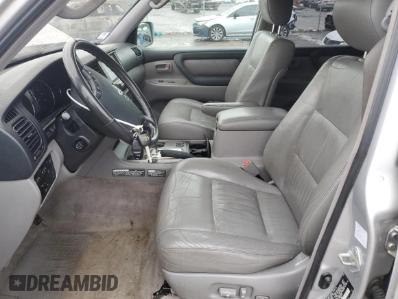 2006 Toyota Land Cruiser z VIN JTEHT05J262087016, wystawiony jako Copart lot #56294635 z przebiegiem 221 315 mil mil oraz Tytuł czysty. Historia ofert i sprzedaży dostępna na DreamBid. Obrazek 7.