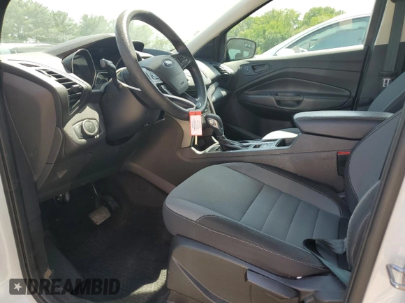 2018 Ford Escape S with VIN 1FMCU0F76JUD06292, listed as a Copart auction lot 56584245 with 136,973 mi miles and Salvage title. Bid and sale history available at DreamBid. Image 7.
