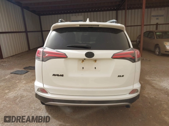 2018 Toyota RAV4 XLE with VIN JTMWFREV2JJ730568, listed as a IAAI auction lot 41814302 with 108,622 mi miles and . Bid and sale history available at DreamBid. Image 15.