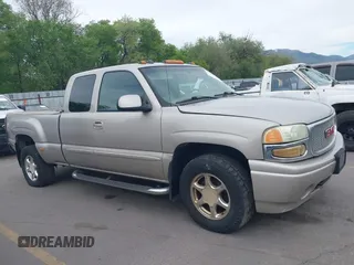 2004 GMC Sierra Denali z VIN 2GTFK69U741354475, wystawiony jako IAAI lot #42334568 z przebiegiem 305 379 mil mil oraz . Historia ofert i sprzedaży dostępna na DreamBid. Obrazek 12.