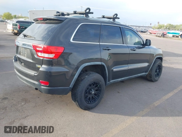 2011 Jeep Grand Cherokee 70th Anniversary with VIN 1J4RR4GG1BC588848, listed as a IAAI auction lot 42117042 with 168,273 mi miles. Bid and sale history available at carsss.com. Image 4.