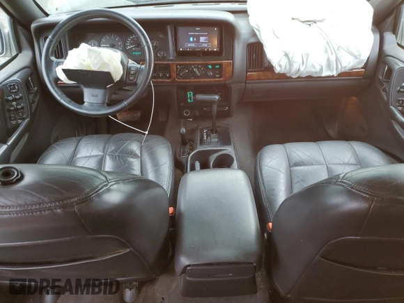 1997 Jeep Grand Cherokee Limited with VIN 1J4GZ78Y4VC693193, listed as a Copart auction lot 46327885 with 235,553 mi miles and Salvage Title. Bid and sale history available at carsss.com. Image 8.