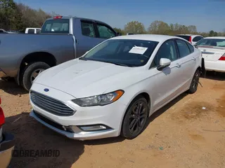 2018 Ford Fusion SE with VIN 3FA6P0H76JR227014, listed as a IAAI auction lot 41901203 with 147,454 mi miles and . Bid and sale history available at DreamBid. Image 2.