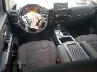 2015 Nissan Titan SV z VIN 1N6BA0EC0FN503240, wystawiony jako Copart lot #72539284 z przebiegiem 149 416 mil mil oraz Szkoda całkowita • Salvage title. Historia ofert i sprzedaży dostępna na DreamBid. Obrazek 8.