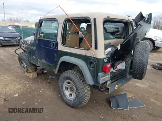 1997 Jeep Wrangler SE with VIN 1J4FY29PXVP406939, listed as a IAAI auction lot 41612380 with 248,314 mi miles. Bid and sale history available at carsss.com. Image 3.