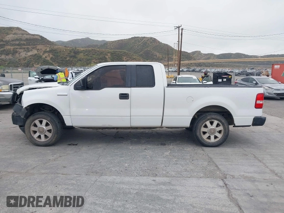 2007 Ford F-150 STX with VIN 1FTRX12W57FA45095, listed as a IAAI auction lot 41880108 with 168,216 mi miles and . Bid and sale history available at DreamBid. Image 14.