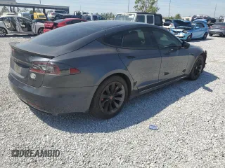 2016 Tesla Model S 90D with VIN 5YJSA1E27GF171698, listed as a Copart auction lot 49176205 with 107,913 mi miles and Salvage Title. Bid and sale history available at DreamBid. Image 3.