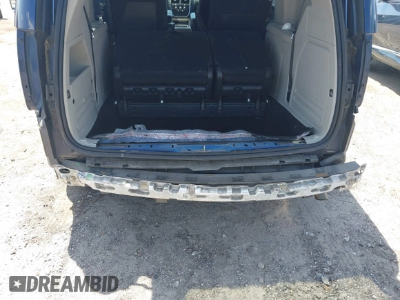 2014 Dodge Grand Caravan SXT with VIN 2C4RDGCG3ER266199, listed as a IAAI auction lot 42119064 with 148,067 mi miles and . Bid and sale history available at DreamBid. Image 6.