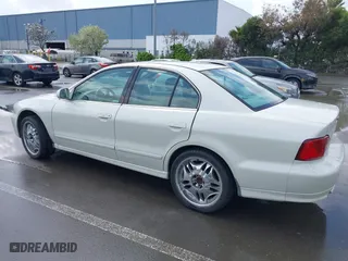2003 Mitsubishi Galant ES with VIN 4A3AA46G23E194144, listed as a IAAI auction lot 41932939 with 164,844 mi miles. Bid and sale history available at carsss.com. Image 3.