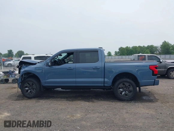 2023 Ford F-150 Lightning Pro with VIN 1FT6W1EVXPWG53591, listed as a IAAI auction lot 42249385 with 17,892 mi miles and . Bid and sale history available at DreamBid. Image 14.