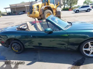 2001 Mazda MX-5 Miata with VIN JM1NB353410203981, listed as a IAAI auction lot 42028077 with Not Provided miles and . Bid and sale history available at DreamBid. Image 13.