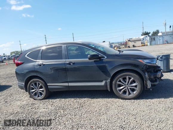 2021 Honda CR-V Touring with VIN 2HKRW2H96MH681908, listed as a IAAI auction lot 42082535 with 65,570 mi miles and . Bid and sale history available at DreamBid. Image 14.