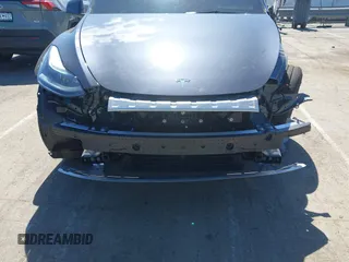 2024 Tesla Model Y Performance with VIN 7SAYGDEF1RA329825, listed as a IAAI auction lot 41762602 with 3,923 mi miles and . Bid and sale history available at DreamBid. Image 6.