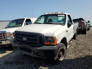 1999 Ford F-350 with VIN 1FDSF35L6XEA33184, listed as a Copart auction lot 69857024 with 100,545 mi miles and Salvage title. Bid and sale history available at DreamBid. Image 1.