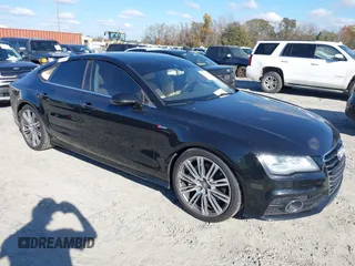 2013 Audi A7 3.0 Prestige with VIN WAU2GAFC2DN065112, listed as a IAAI auction lot 41117426 with 159,105 mi miles. Bid and sale history available at carsss.com. Image 1.