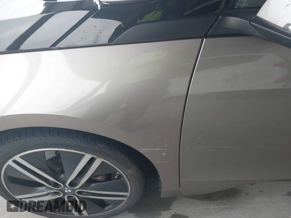 2014 BMW i3 with VIN WBY1Z4C57EV276127, listed as a IAAI auction lot 41531408 with 105,696 mi miles and . Bid and sale history available at DreamBid. Image 15.