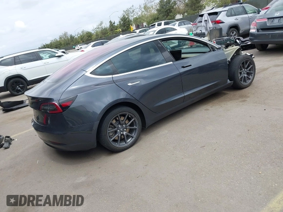 2018 Tesla Model 3 Long Range Battery with VIN 5YJ3E1EA7JF019962, listed as a IAAI auction lot 42024190 with 161,473 mi miles and . Bid and sale history available at DreamBid. Image 4.