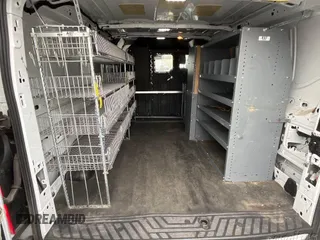 2016 Ford Transit Cargo with VIN 1FTYE1YM9GKB19536, listed as a IAAI auction lot 42219052 with 121,978 mi miles. Bid and sale history available at carsss.com. Image 1.