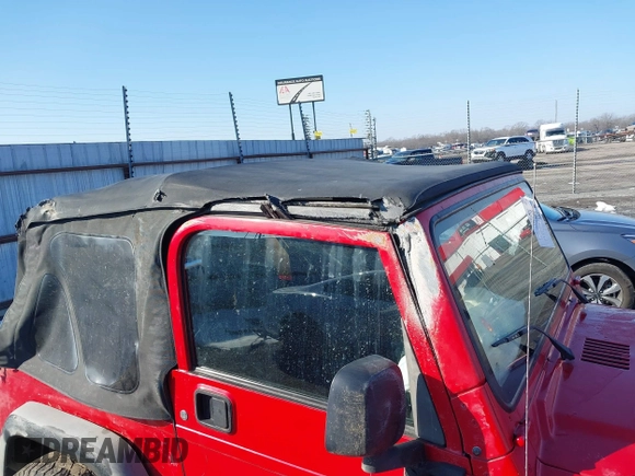 2005 Jeep Wrangler X with VIN 1J4FA39S95P385581, listed as a IAAI auction lot 41333338 with 150,010 mi miles and . Bid and sale history available at DreamBid. Image 12.