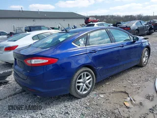 2014 Ford Fusion SE with VIN 3FA6P0H72ER374386, listed as a IAAI auction lot 41938833 with 140,095 mi miles. Bid and sale history available at carsss.com. Image 4.