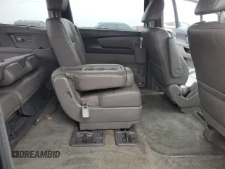 2015 Honda Odyssey Touring Elite z VIN 5FNRL5H93FB092682, wystawiony jako Copart lot #56884835 z przebiegiem 115 810 mil mil oraz Szkoda całkowita • Salvage title. Historia ofert i sprzedaży dostępna na DreamBid. Obrazek 11.