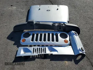 2007 Jeep Wrangler Unlimited Sahara with VIN 1J4GB59197L144781, listed as a Copart auction lot 48678315 with 137,538 mi miles and Salvage title. Bid and sale history available at DreamBid. Image 13.