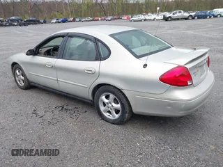 2003 Ford Taurus SES Standard with VIN 1FAFP55U43A140202, listed as a IAAI auction lot 41994960 with 90,650 mi miles. Bid and sale history available at carsss.com. Image 3.