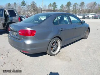 2014 Volkswagen Jetta Sedan S with VIN 3VW2K7AJ1EM329682, listed as a IAAI auction lot 41715820 with 182,782 mi miles. Bid and sale history available at carsss.com. Image 4.